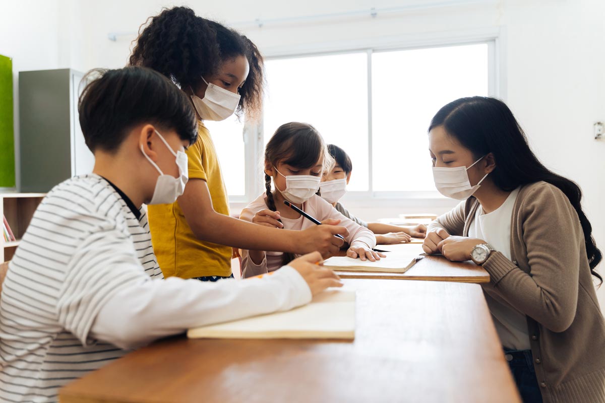 kis-in-classroom-with-masks-on